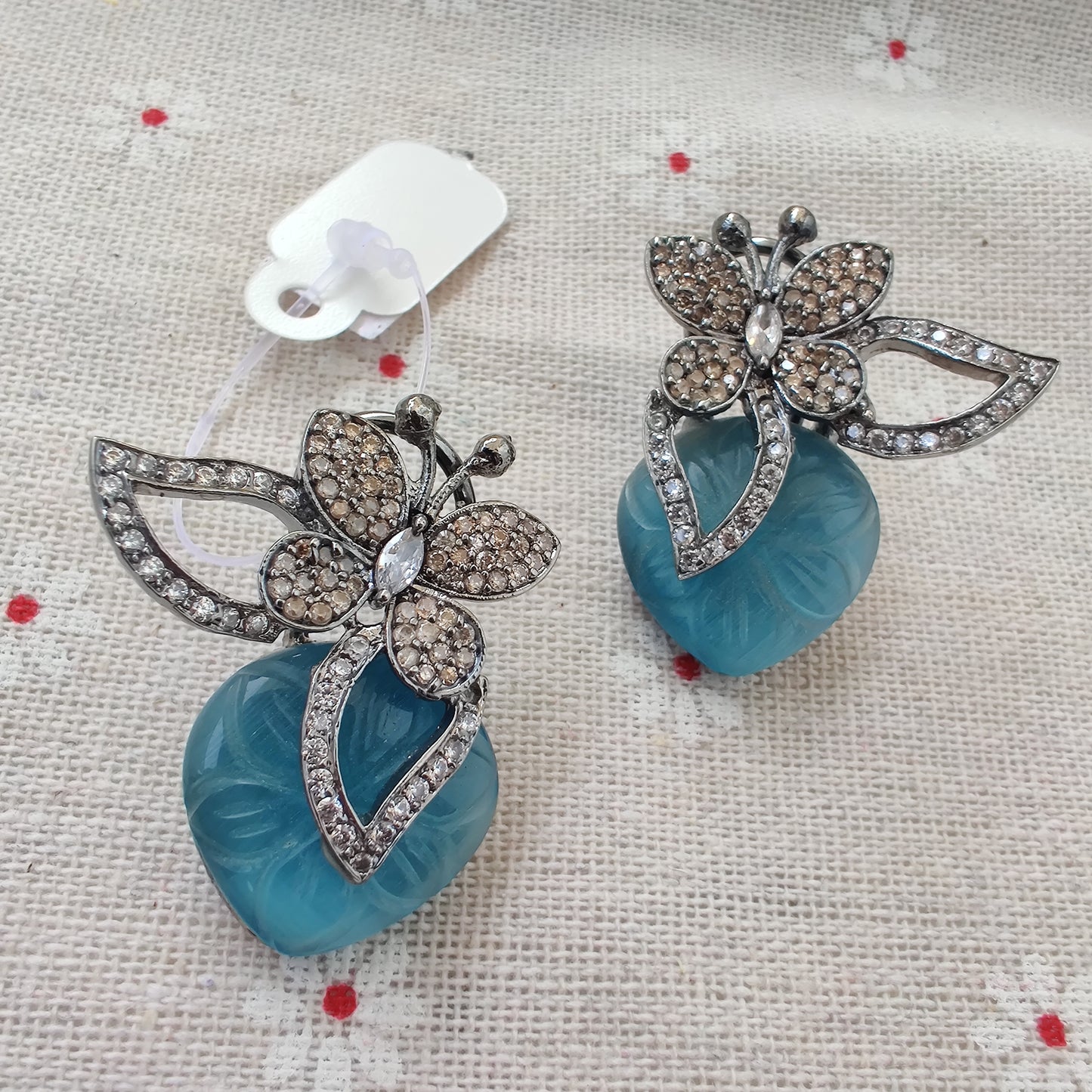 Rhodium Plated Wax Stone Designer Stud Earrings