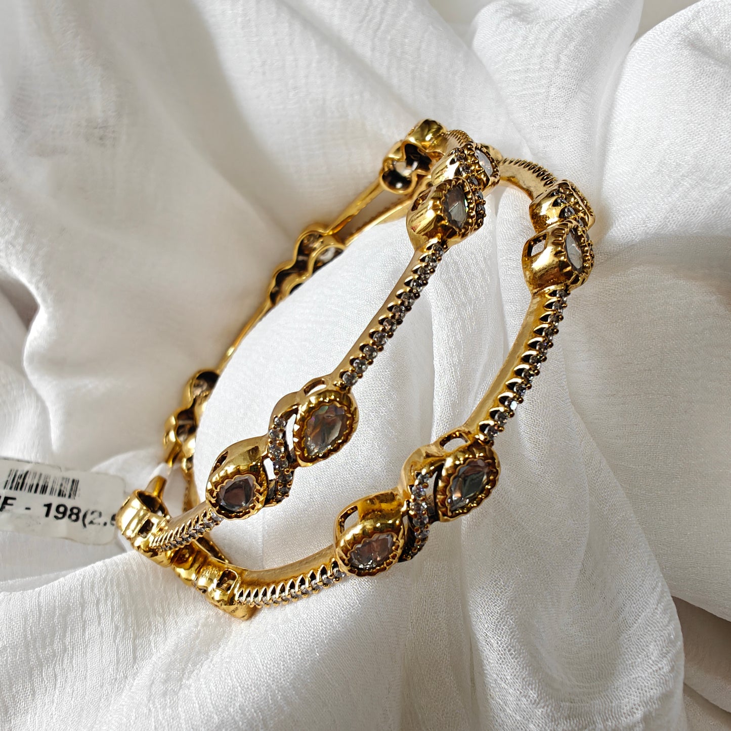 Sleek Polki Studded with channel fitting Bangles