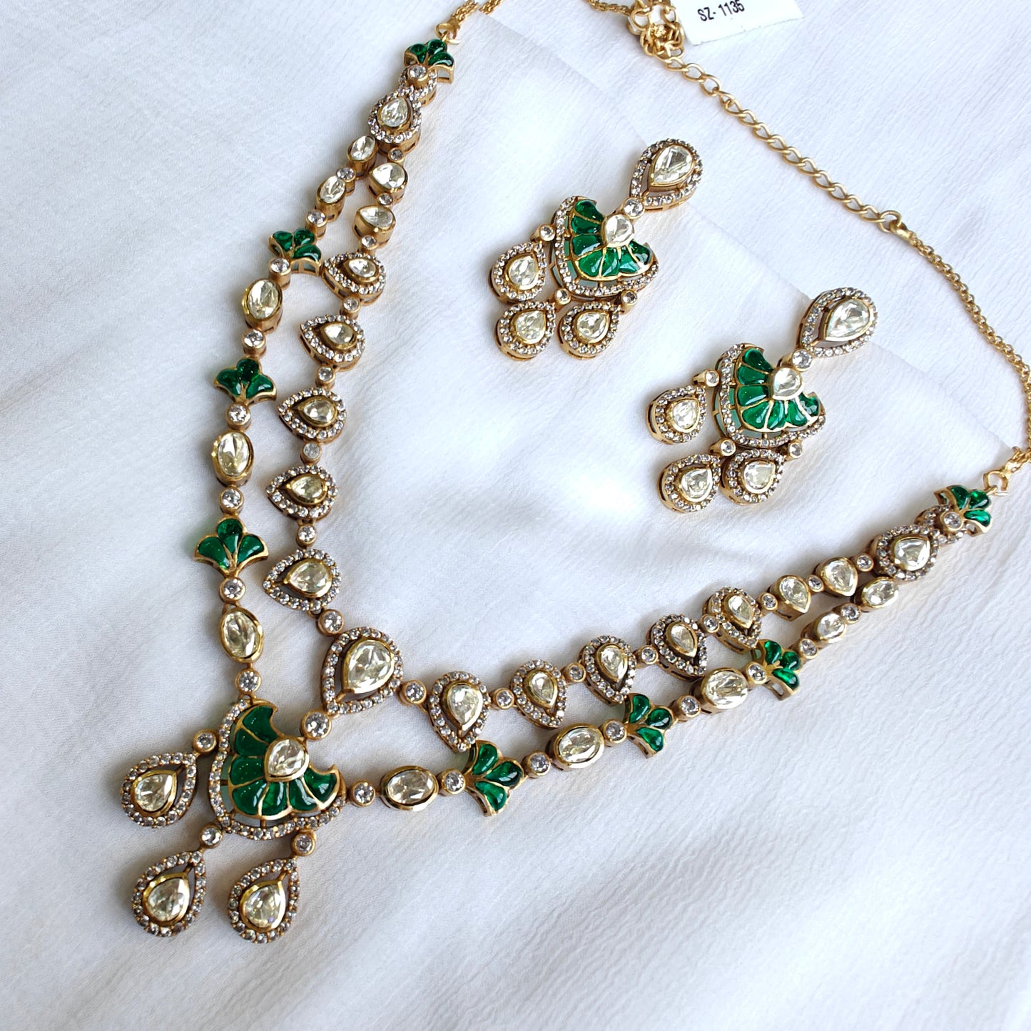 polki and emerald studded double layered necklace