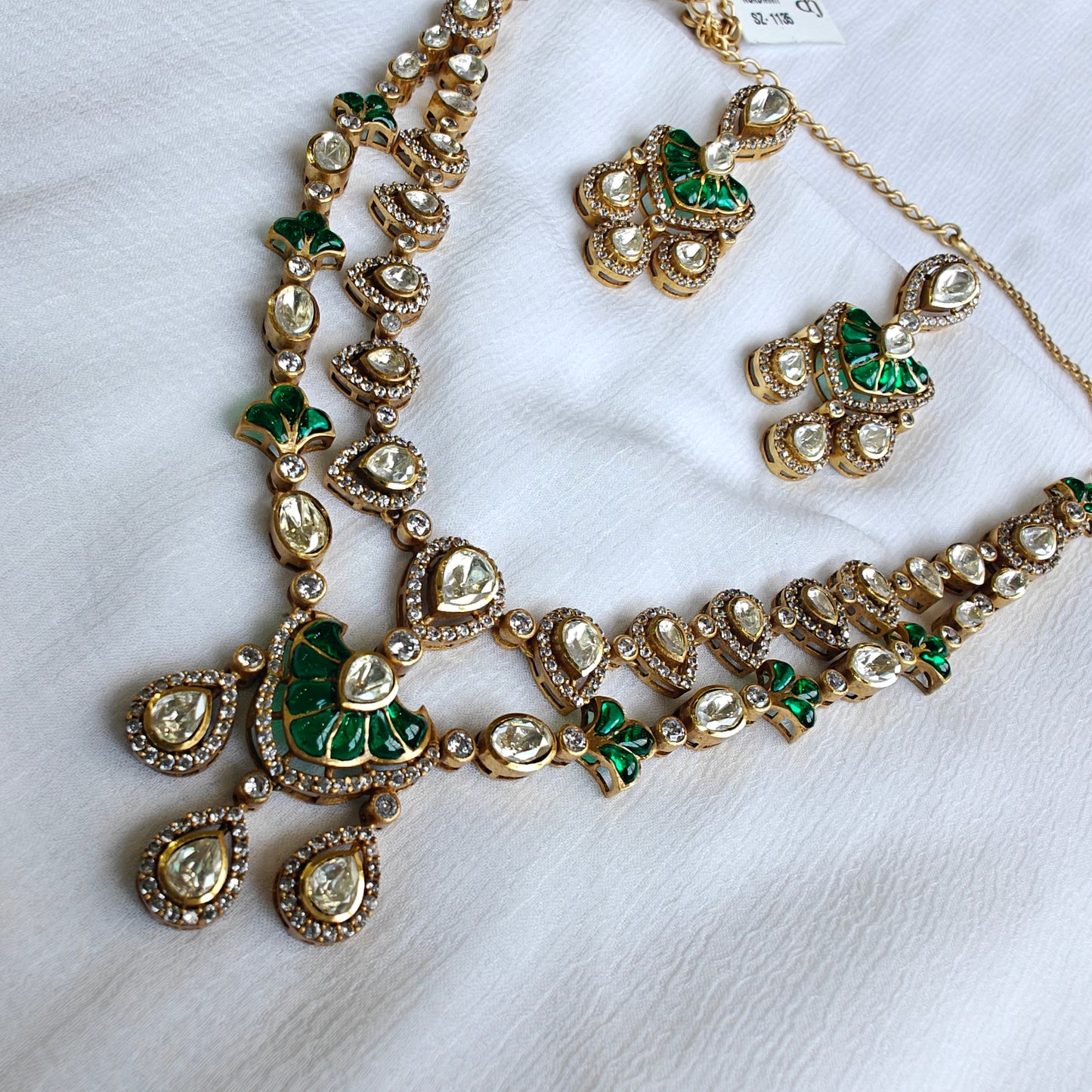 polki and emerald studded double layered necklace