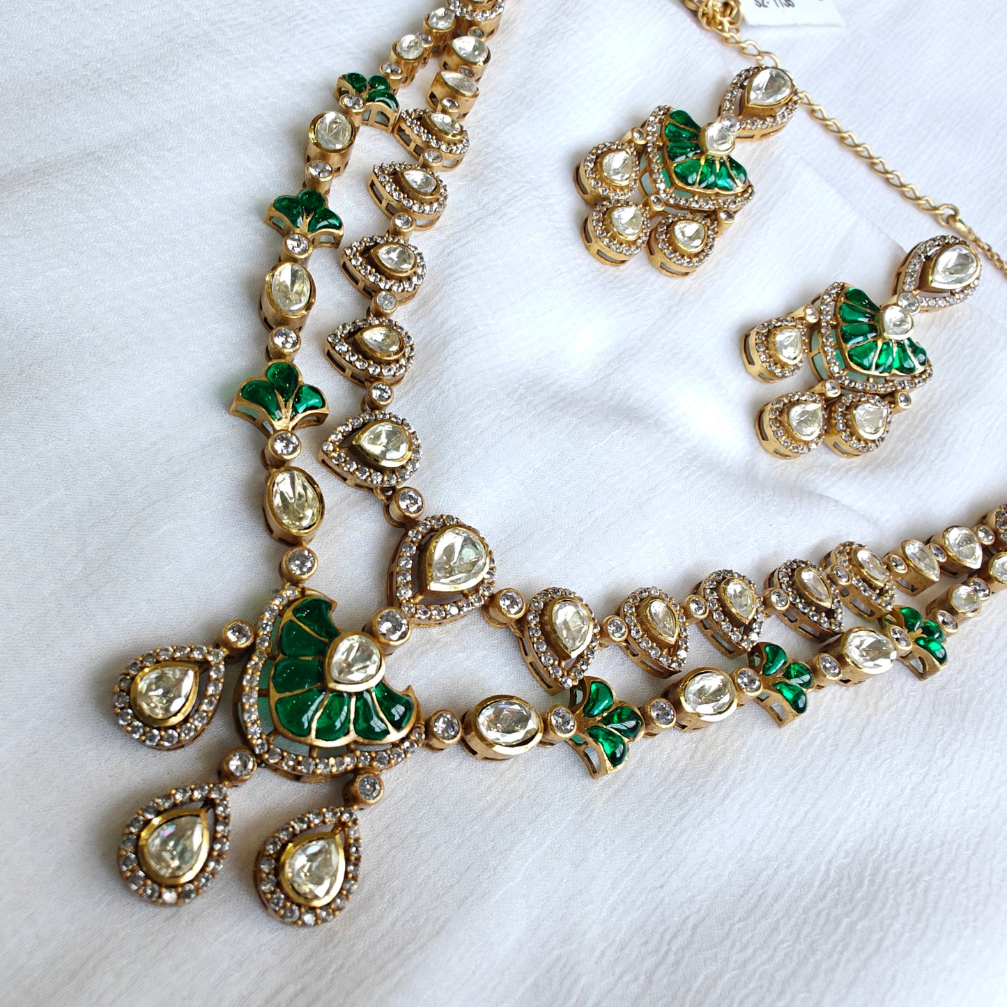 polki and emerald studded double layered necklace