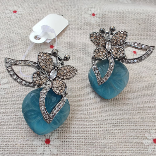 Rhodium Plated Wax Stone Designer Stud Earrings