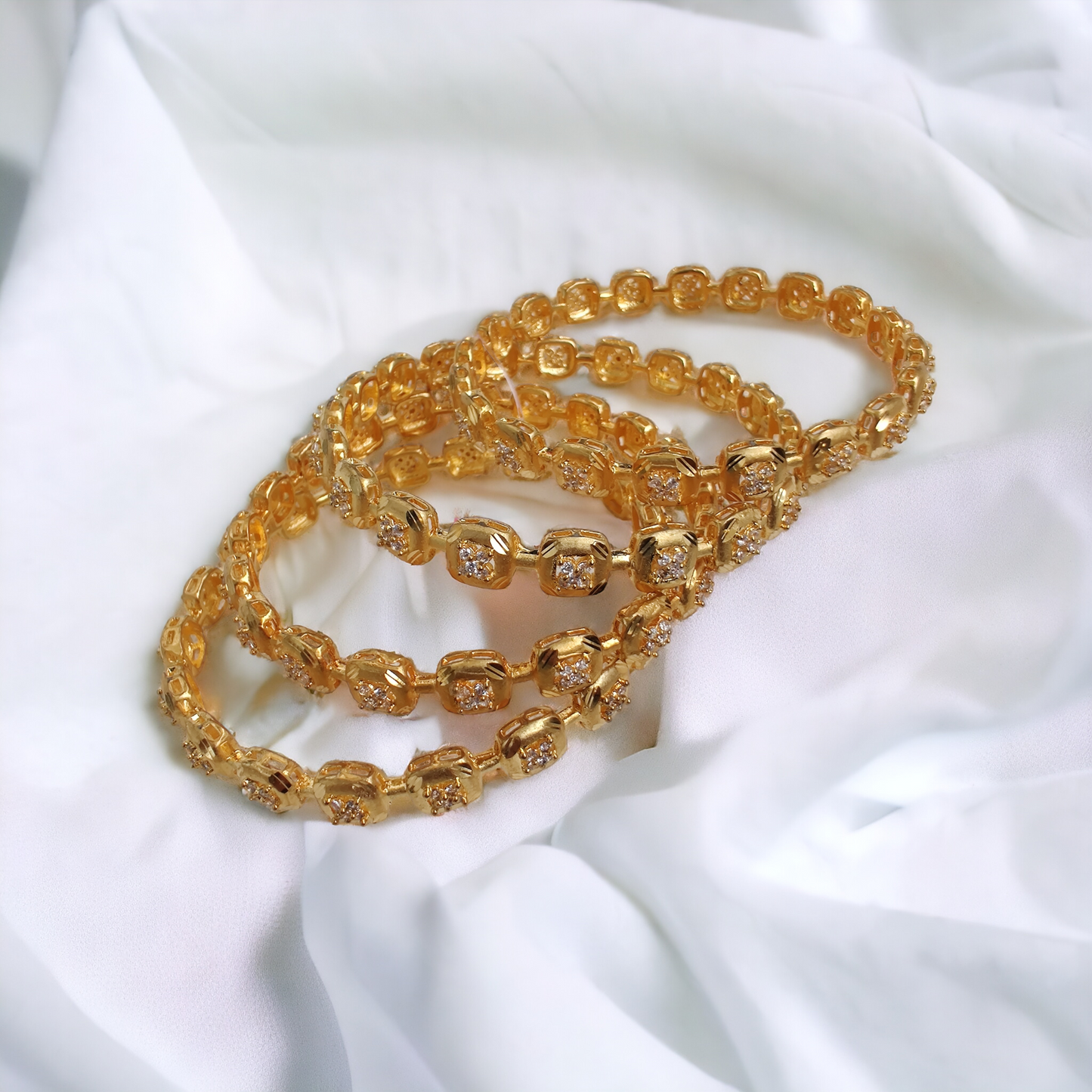 gold plated bangles (set of 4)