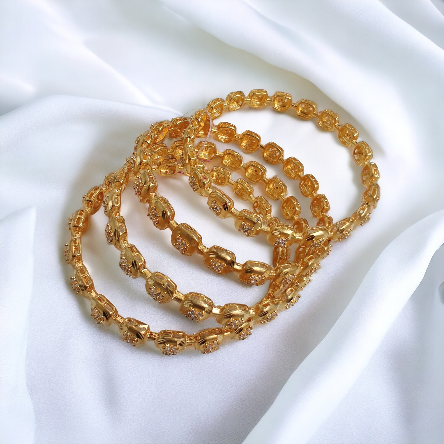 gold plated bangles (set of 4)