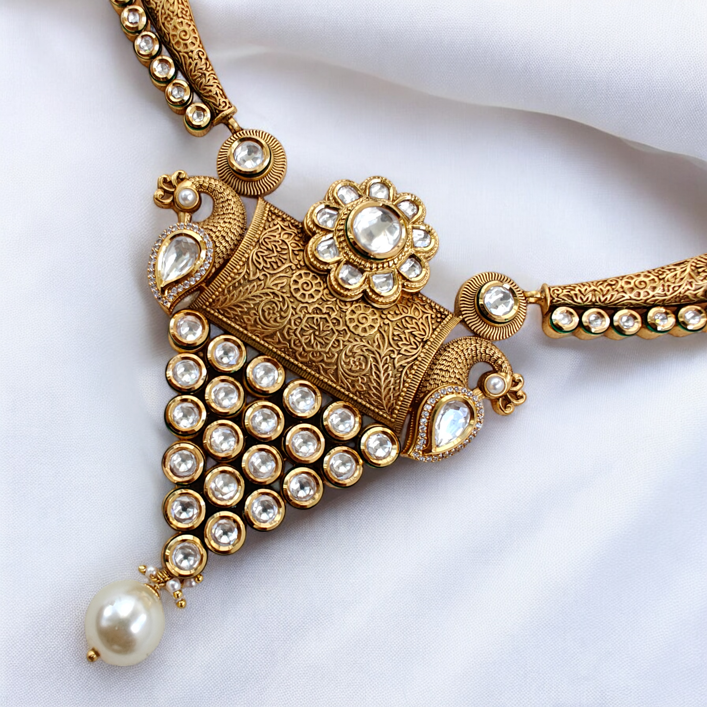 Royal Kundan Studded Hansli Set with Fine Carvings.