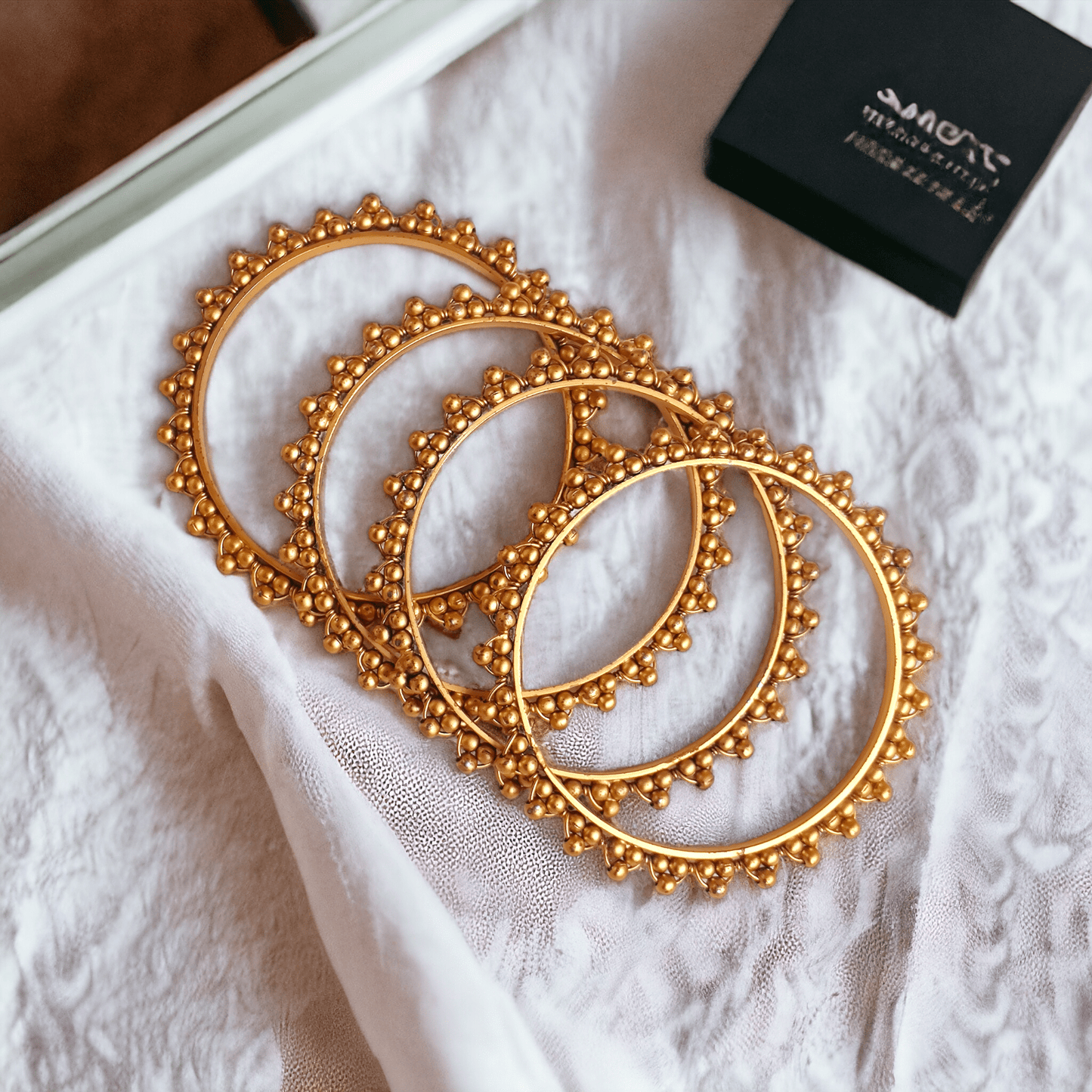 Antique gold bangles (set of 4)