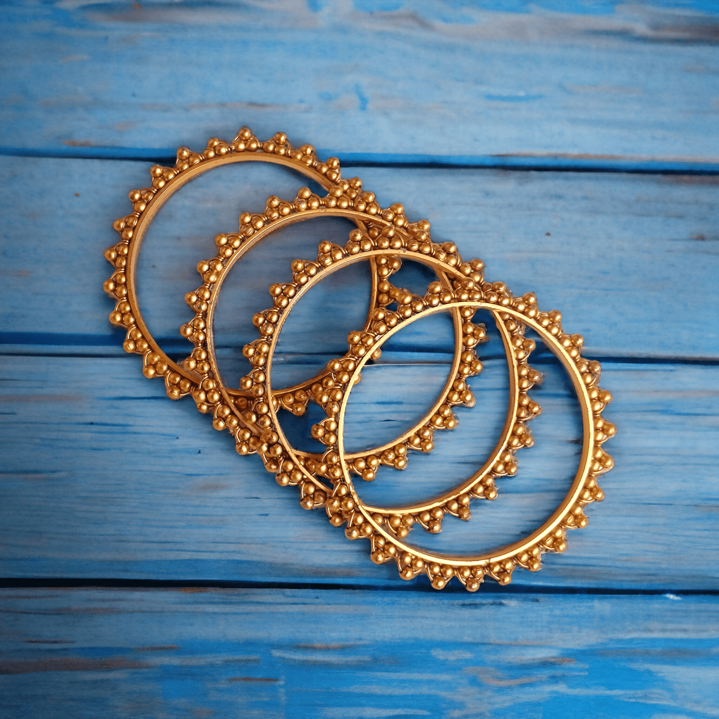 Antique gold bangles (set of 4)